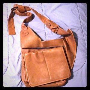 Hipster tan leather messenger bag